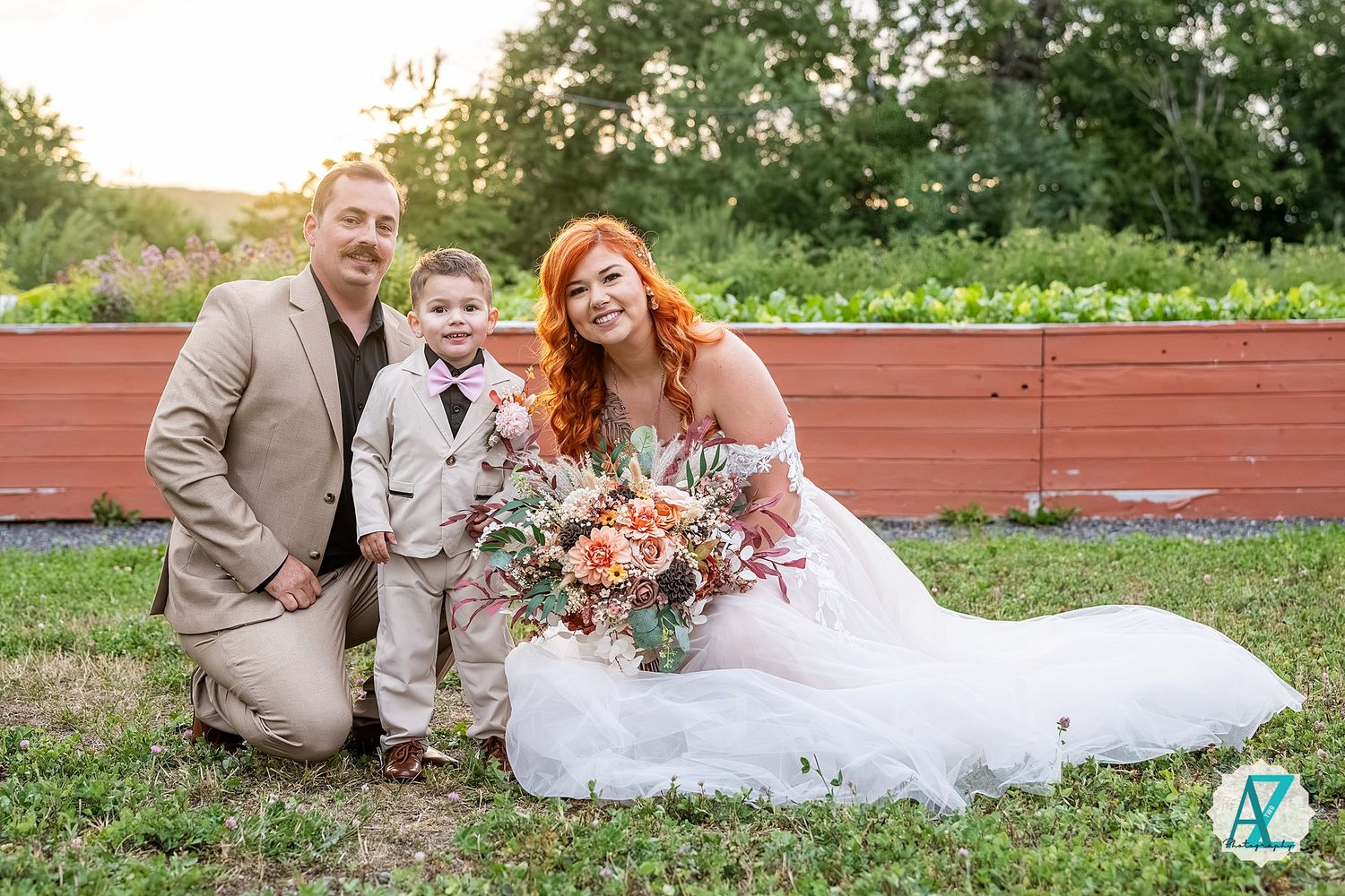 A romantic outdoor wedding scene with a flowing white dress and bouquet of coral flowers in a garden setting.