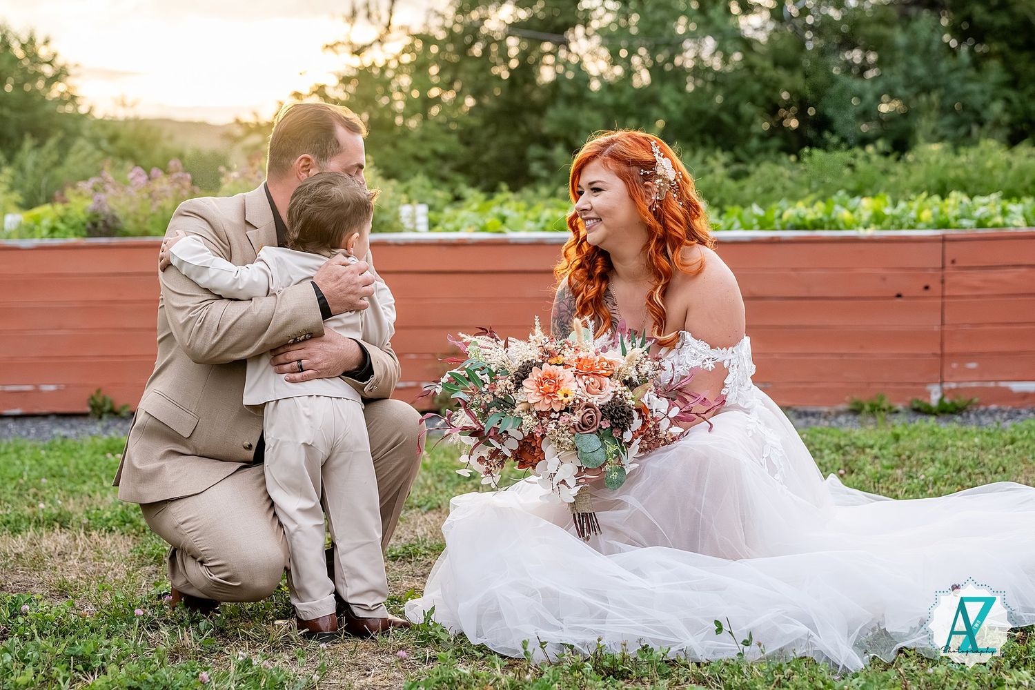 A joyful romantic moment between newlyweds in a lush garden setting at sunset.