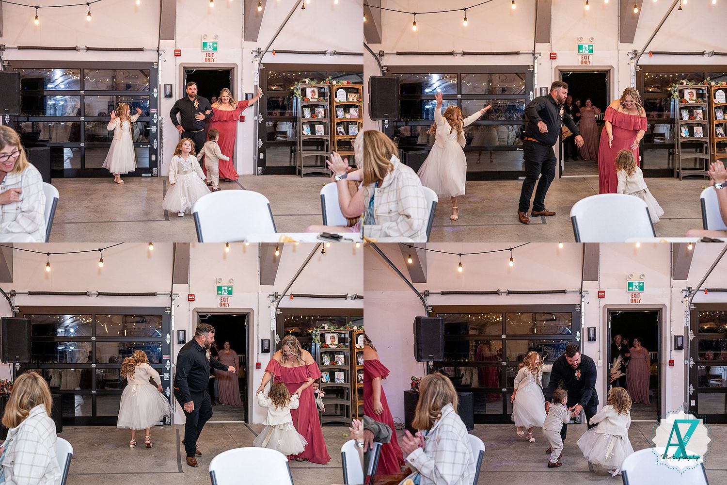 Wedding guests gather on dance floor during lively reception celebration with ambient lighting.