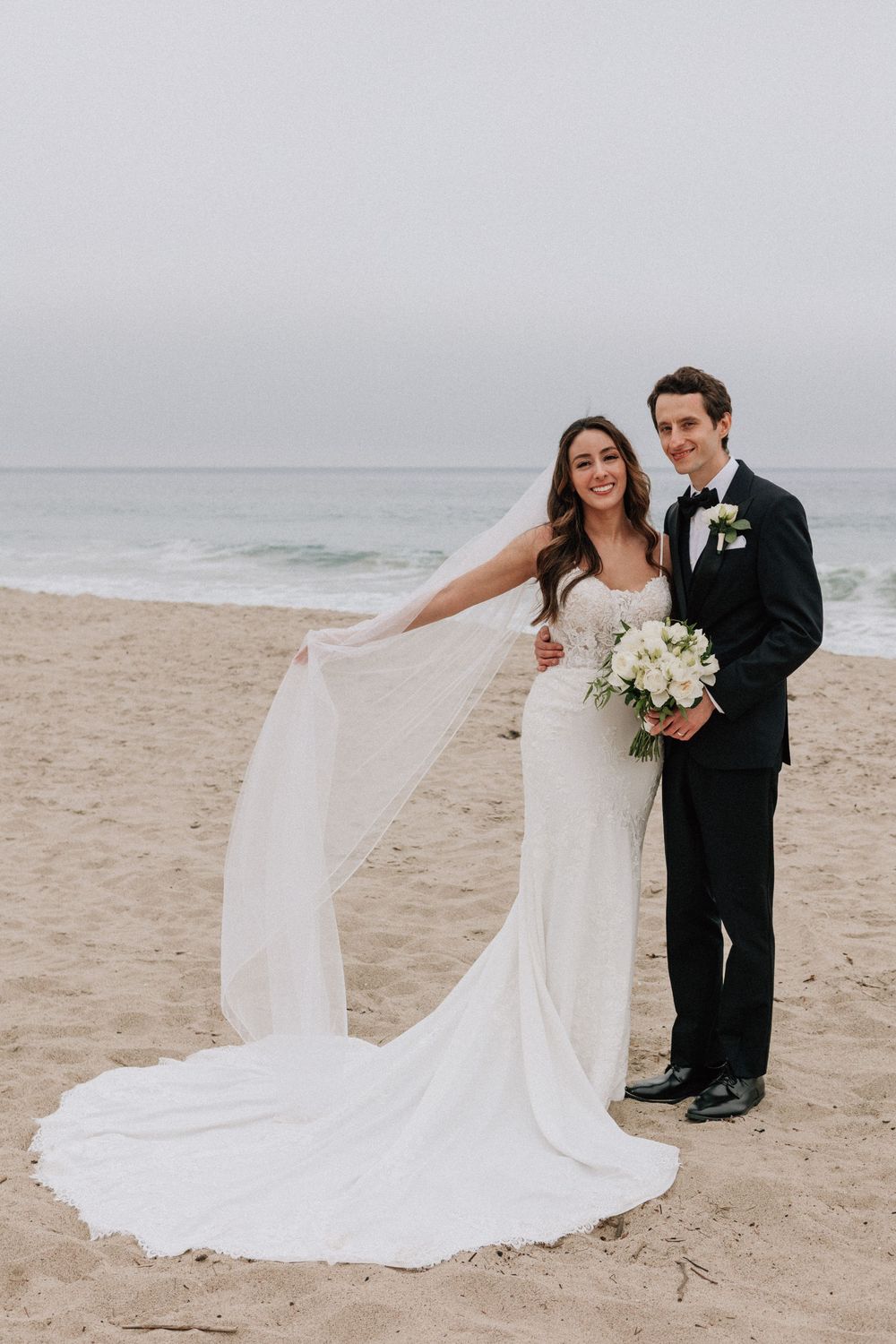 Romantic overcast beach wedding photos in Malibu captured on 35mm film.