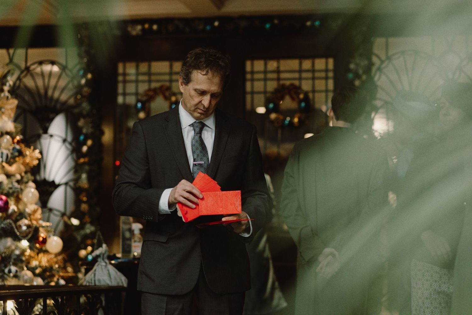 A wedding venue decorated with romantic lighting and traditional Asian elements.