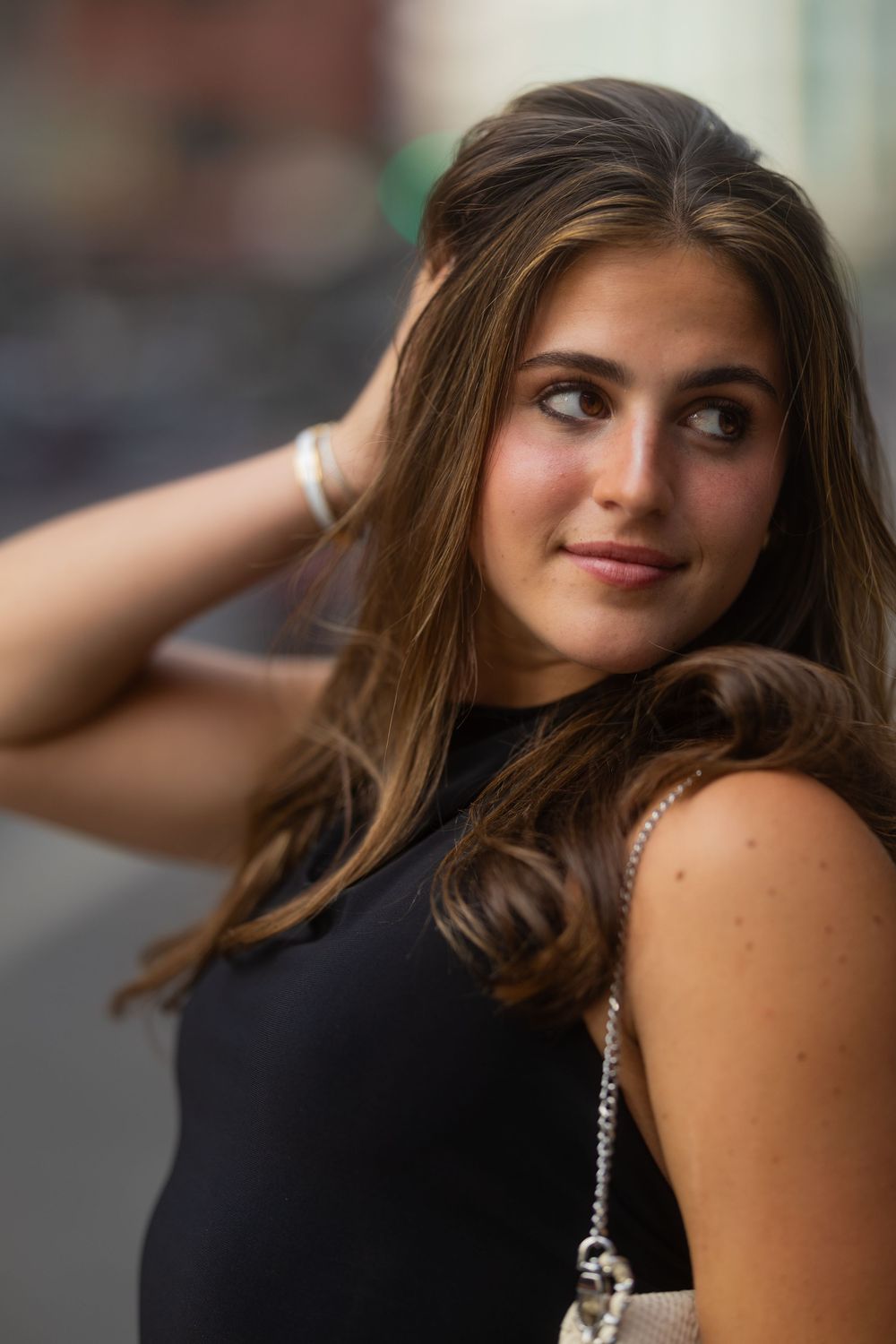 A glamorous portrait series shows 6 shots of someone in a black top with long brown hair looking left and right.