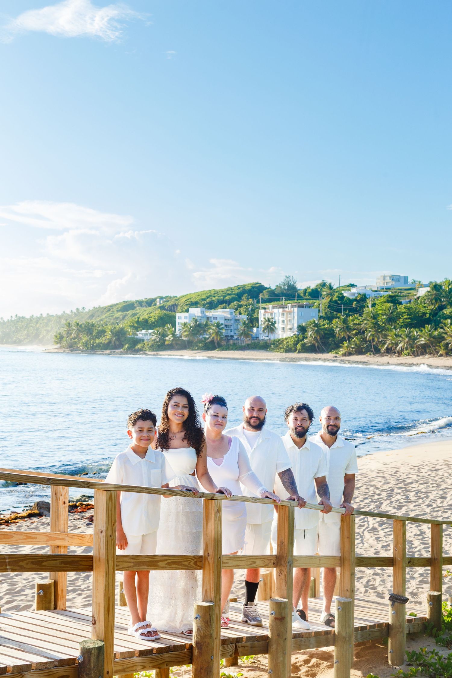 Family portrait on the beach. Playa Mar Chiquita, Puerto Rico.