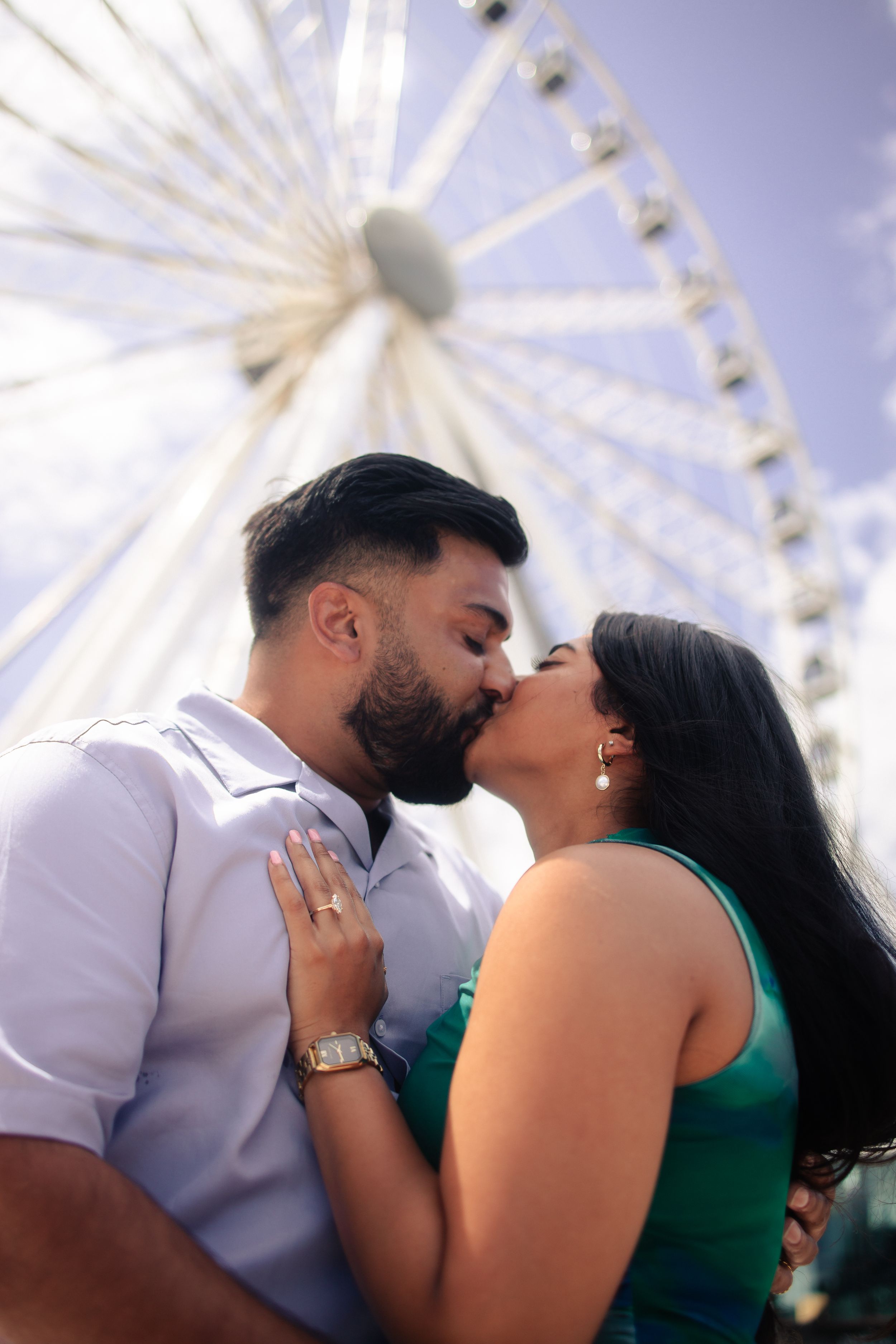 Romantic Miami engagement photo with Ferris wheel, cinematic anniversary session styled for Instagram and Pinterest by MannyPortraits.