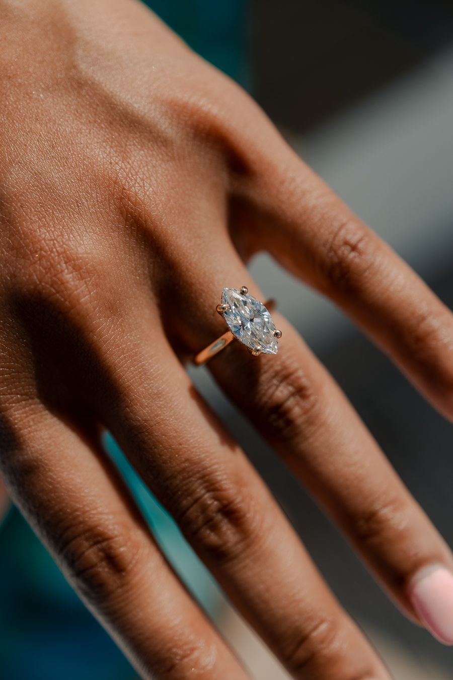 Elegant Tiffany-inspired engagement ring detail, cinematic proposal photography perfect for Pinterest weddings by MannyPortraits.