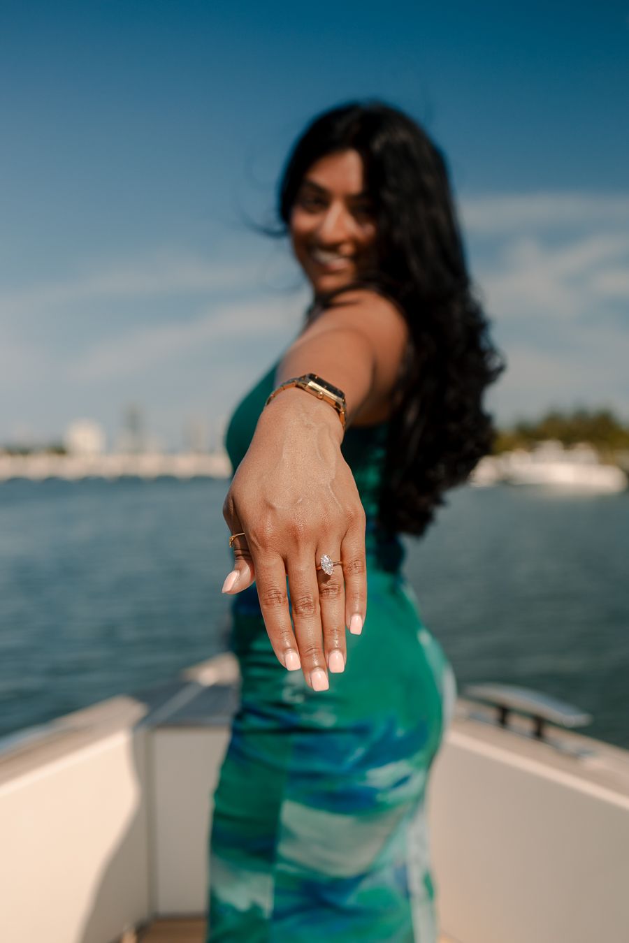 Miami proposal photography on yacht, cinematic engagement ring reveal styled for Instagram and Pinterest by MannyPortraits.