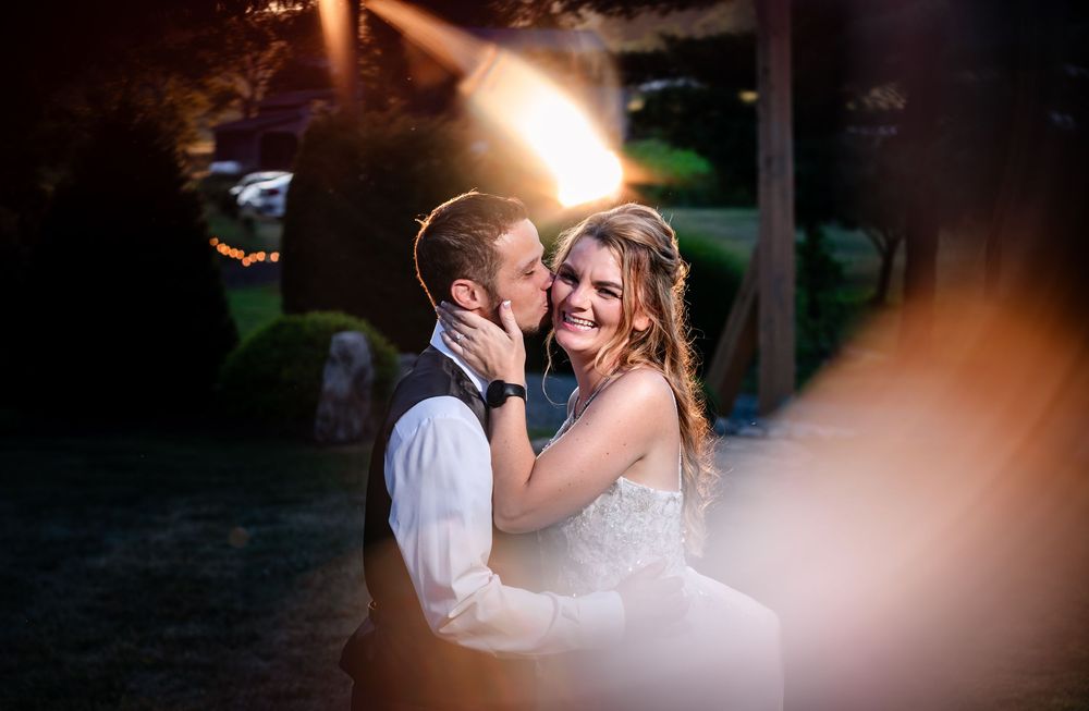 Intimate dance moments captured in soft focus at evening reception.