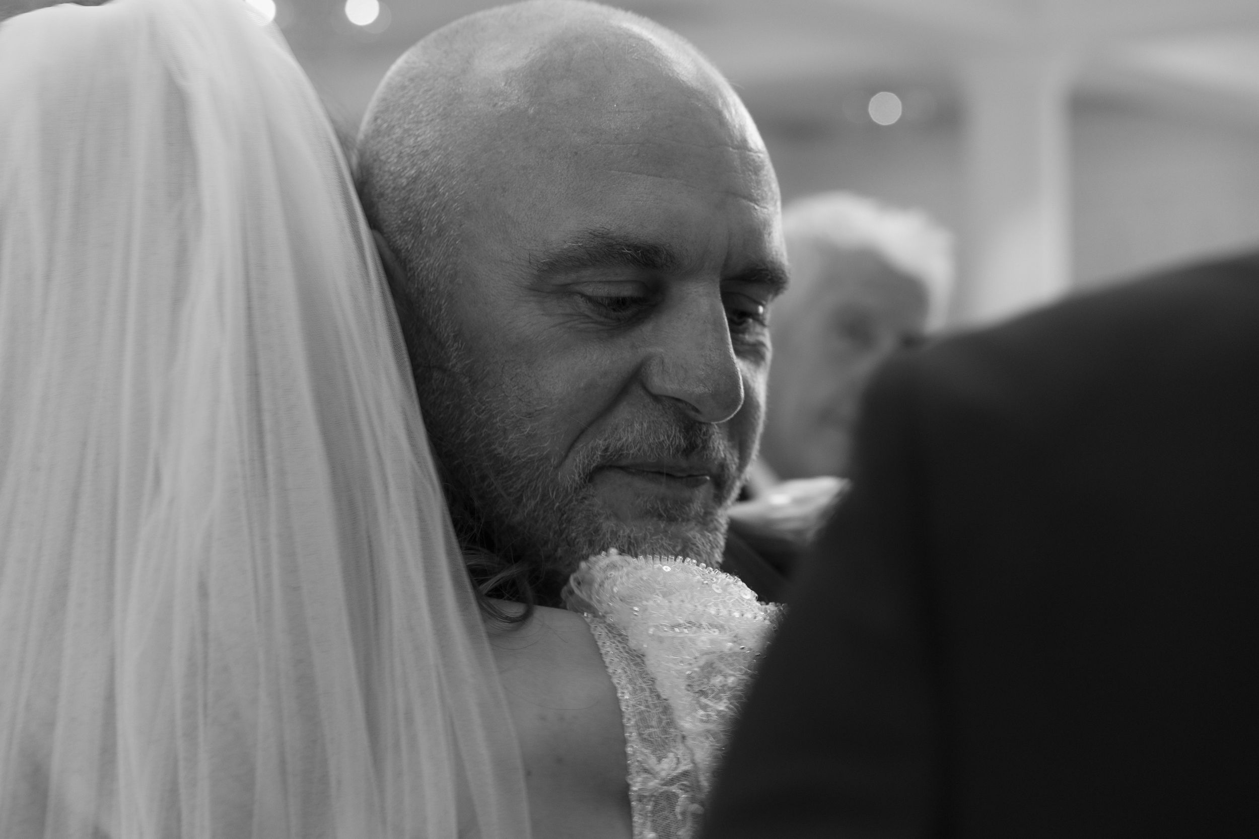 A series of black and white profile photos arranged horizontally showing different candid expressions and emotions.