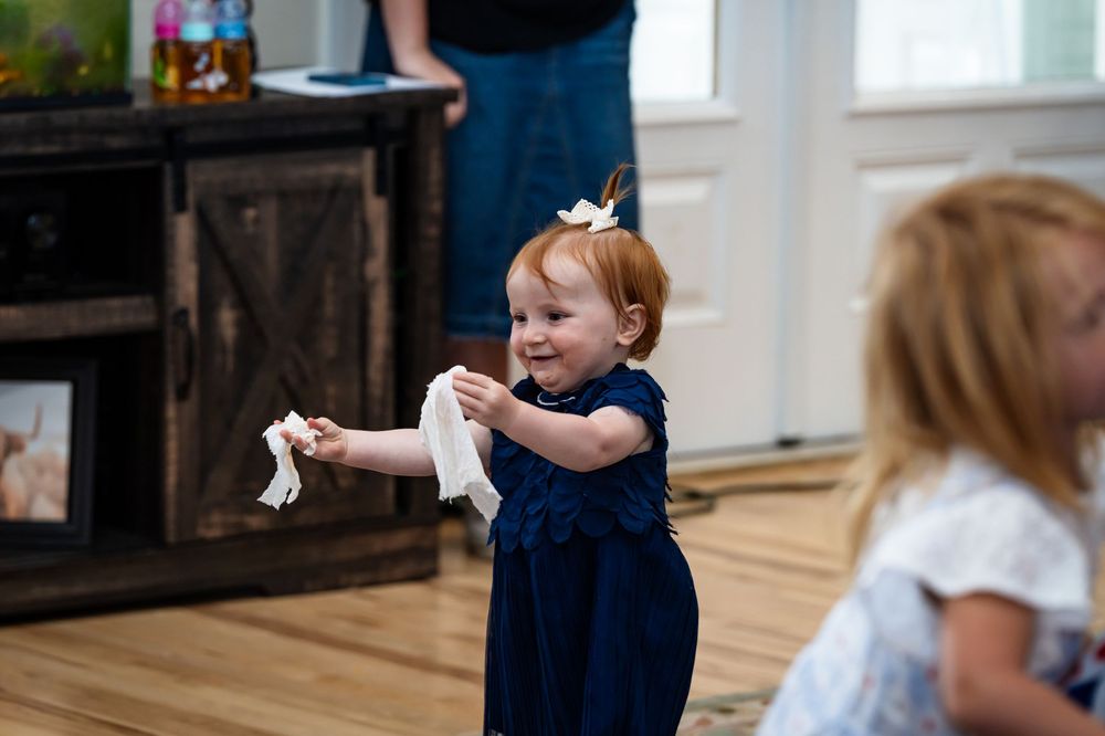 People participating in activities during an indoor social gathering.