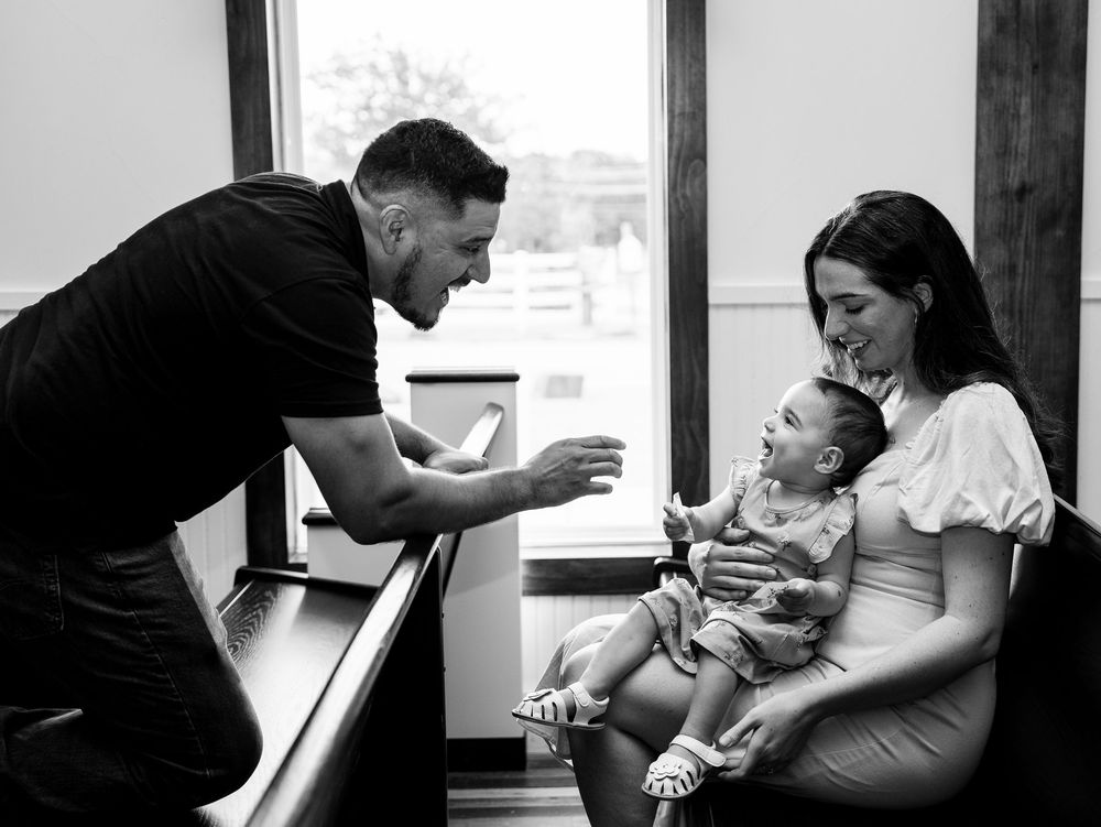 Black and white photo series showing tender moments between parents and infants during feeding and bonding time.