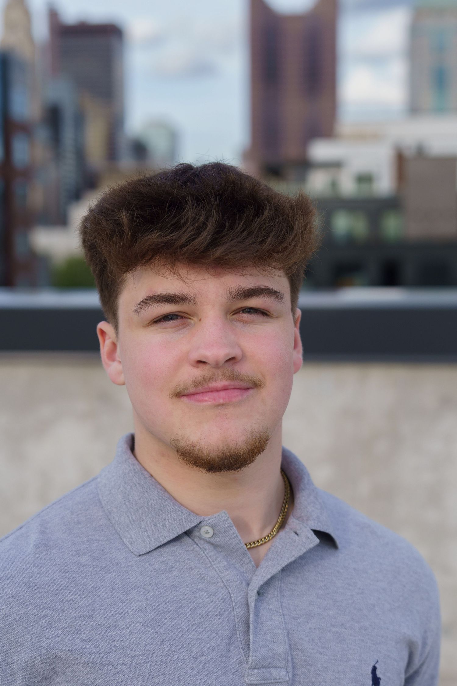 High school senior portrait with downtown Columbus in the background, by Jamie Macey Photography in Columbus, Ohio.