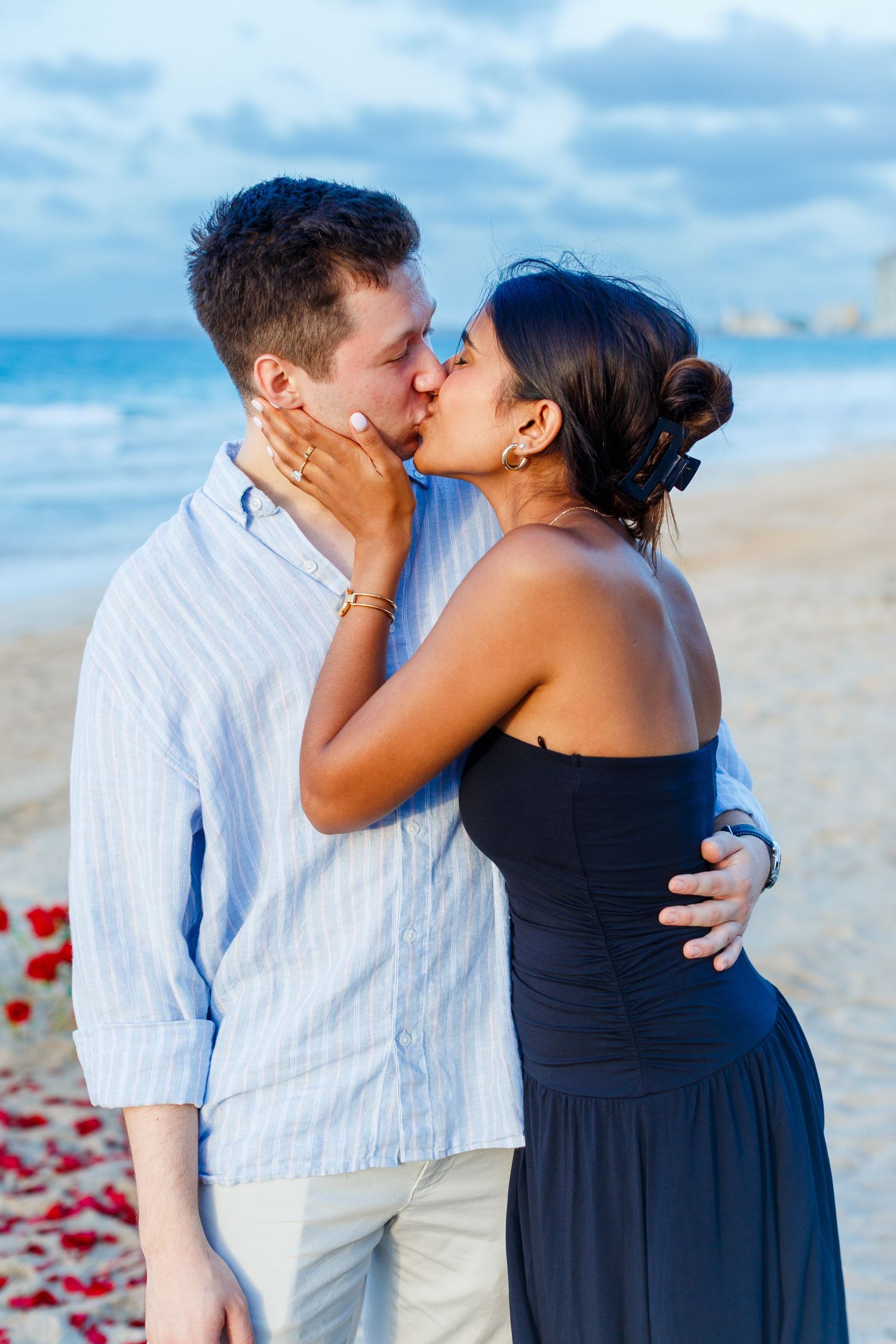 Couples portrait. Marriage proposal on the beach in Isla Verde, Carolina, Puerto Rico.
