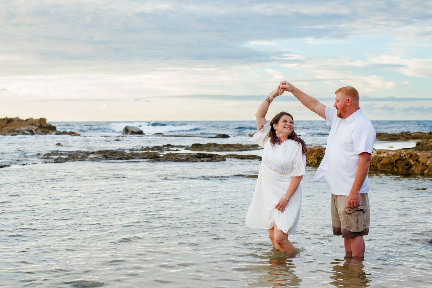 Elopement on the beach at Balneario del Escambrón in Old San Juan, Puerto Rico. Couples portrait - bride and groom.