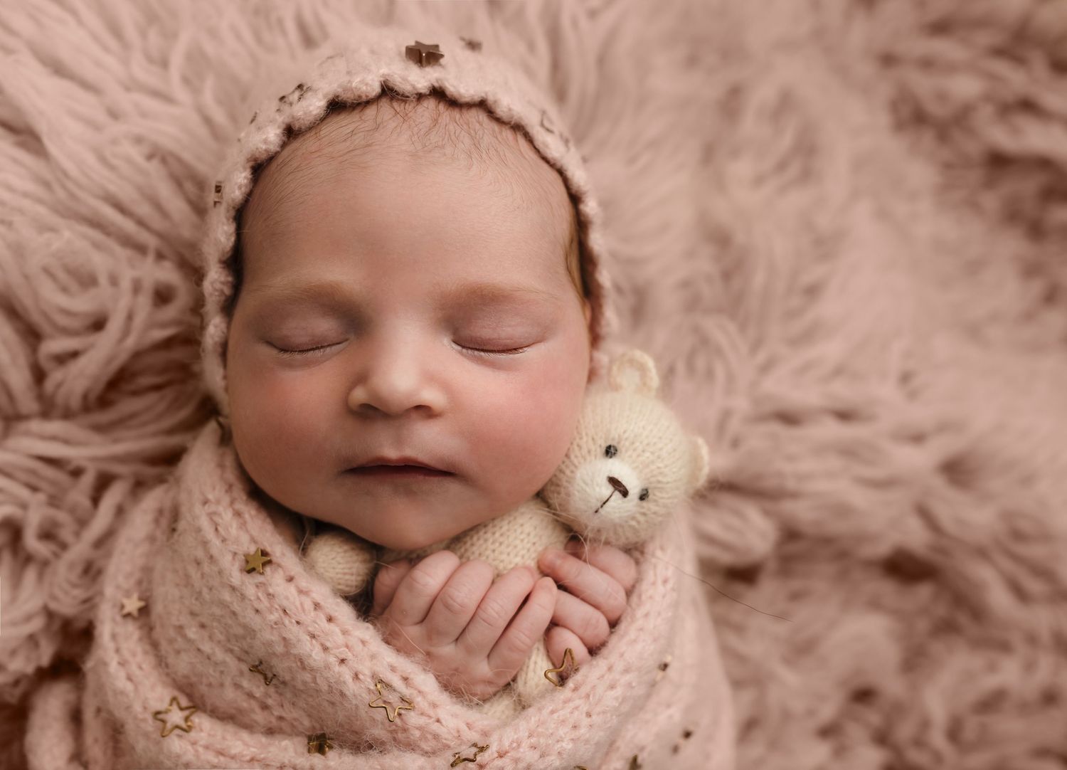 Charlottesville photographer, family, newborn, baby, maternity, baby girl sleeping on a pink flokati and in a pink wrap with starts on it