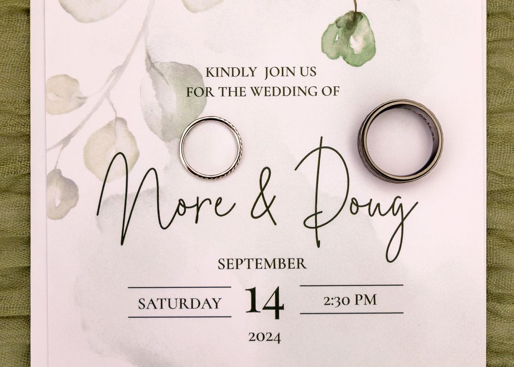 Wedding Invitation & Rings at  backyard wedding in Omaha, Nebraska. - BrightSide Photography