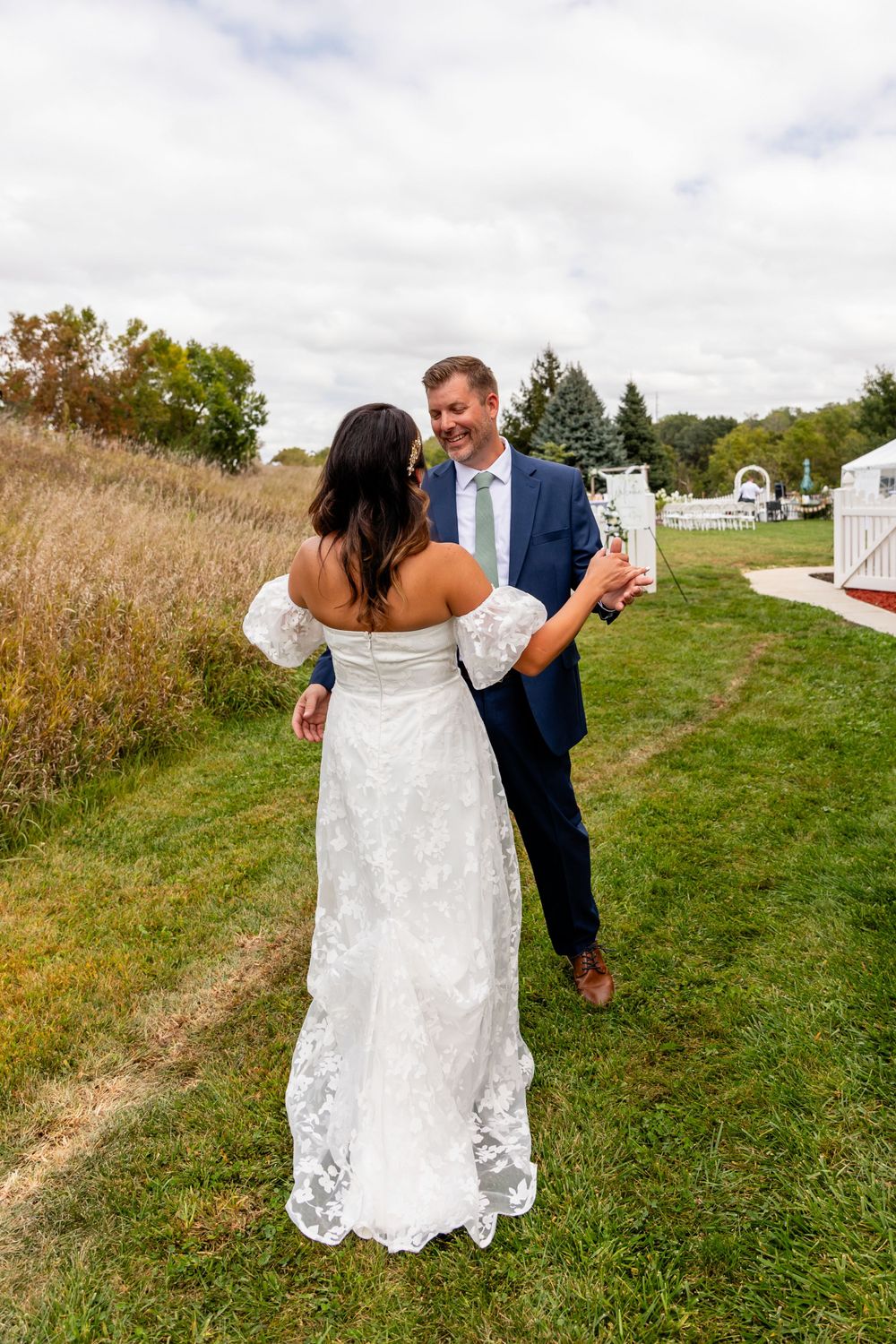 Bride & groom first look at their beautiful storybook backyard wedding in Omaha, Nebraska.
 - BrightSide Photography