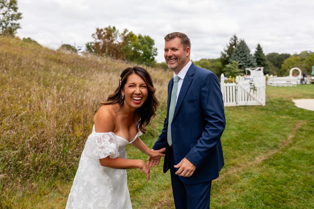 Bride & groom first look at their beautiful storybook backyard wedding in Omaha, Nebraska.
 - BrightSide Photography