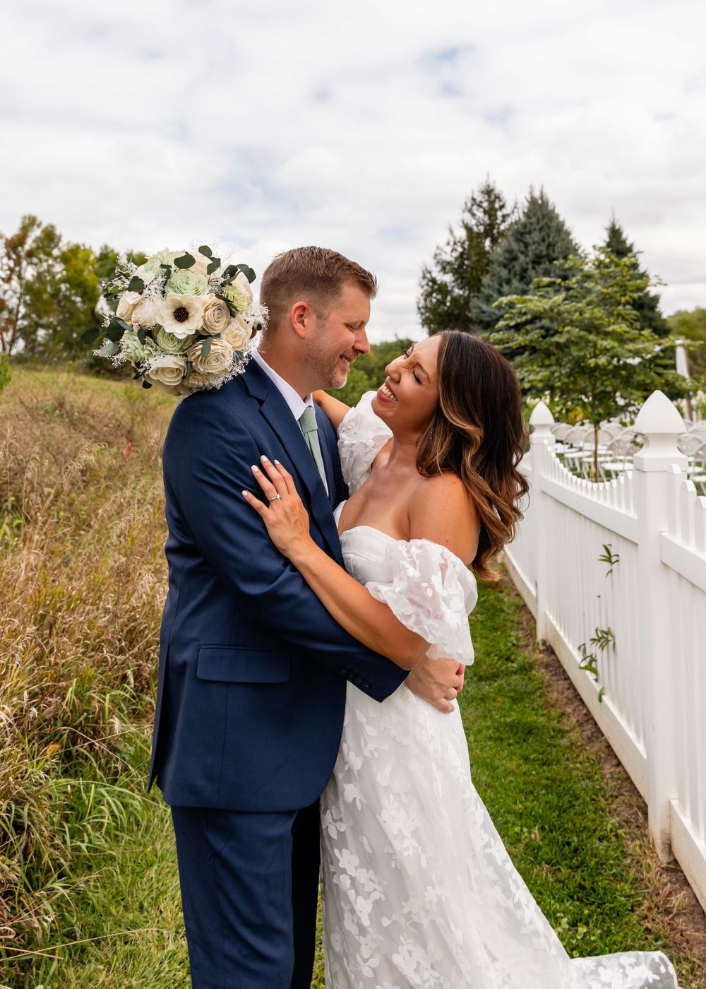 Wedding couple at their garden summer wedding in Omaha, Nebraska. - BrightSide Photography