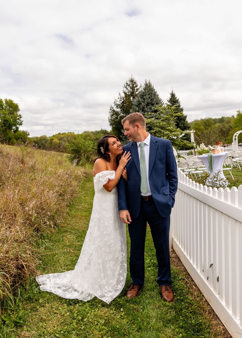 Wedding couple at their garden summer wedding in Omaha, Nebraska. - BrightSide Photography