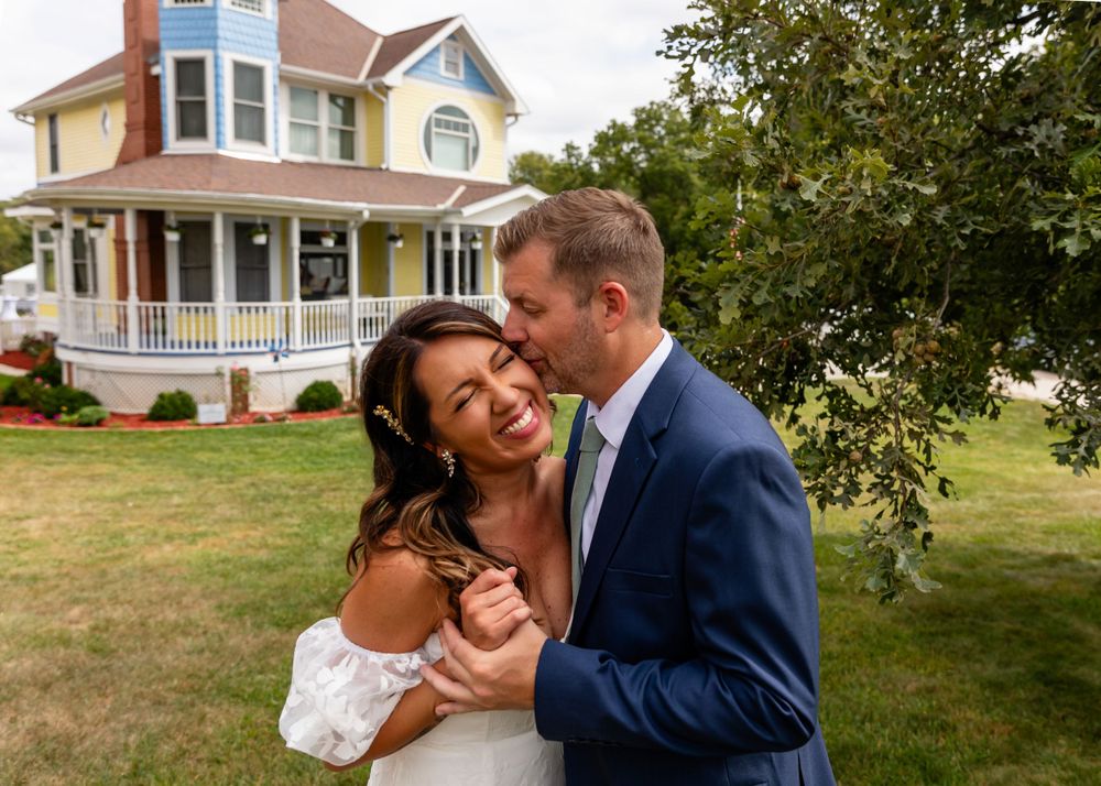 Bride & groom at a beautiful Victorian home backyard wedding in Omaha, Nebraska. - BrightSide Photography