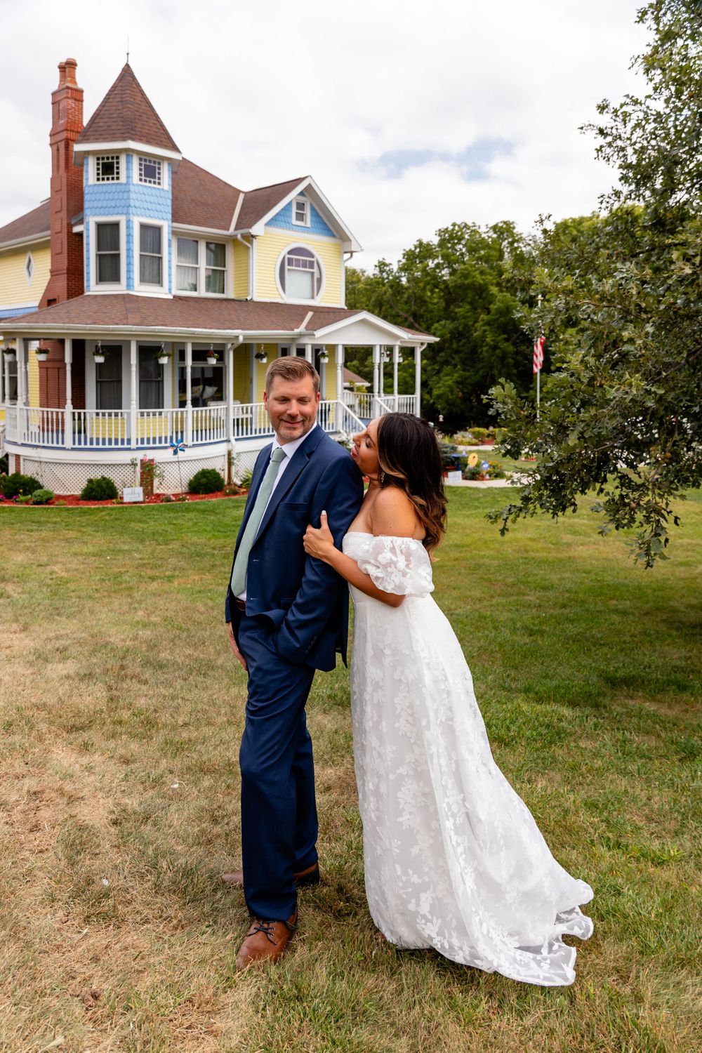 Wedding couple at a beautiful Victorian home backyard wedding in Omaha, Nebraska. - BrightSide Photography