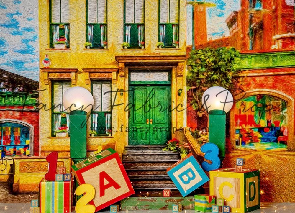 Colorful illustration of a city street with toy blocks, featuring vibrant yellow buildings and green shuttered windows.