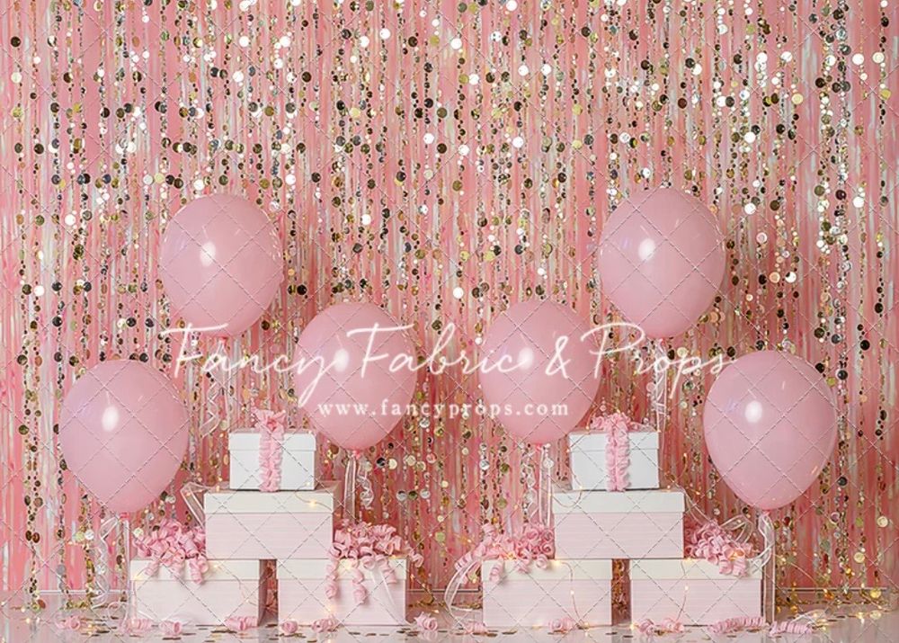 Pink balloon and gift box party setup against a sparkly pink sequin backdrop for elegant celebrations.