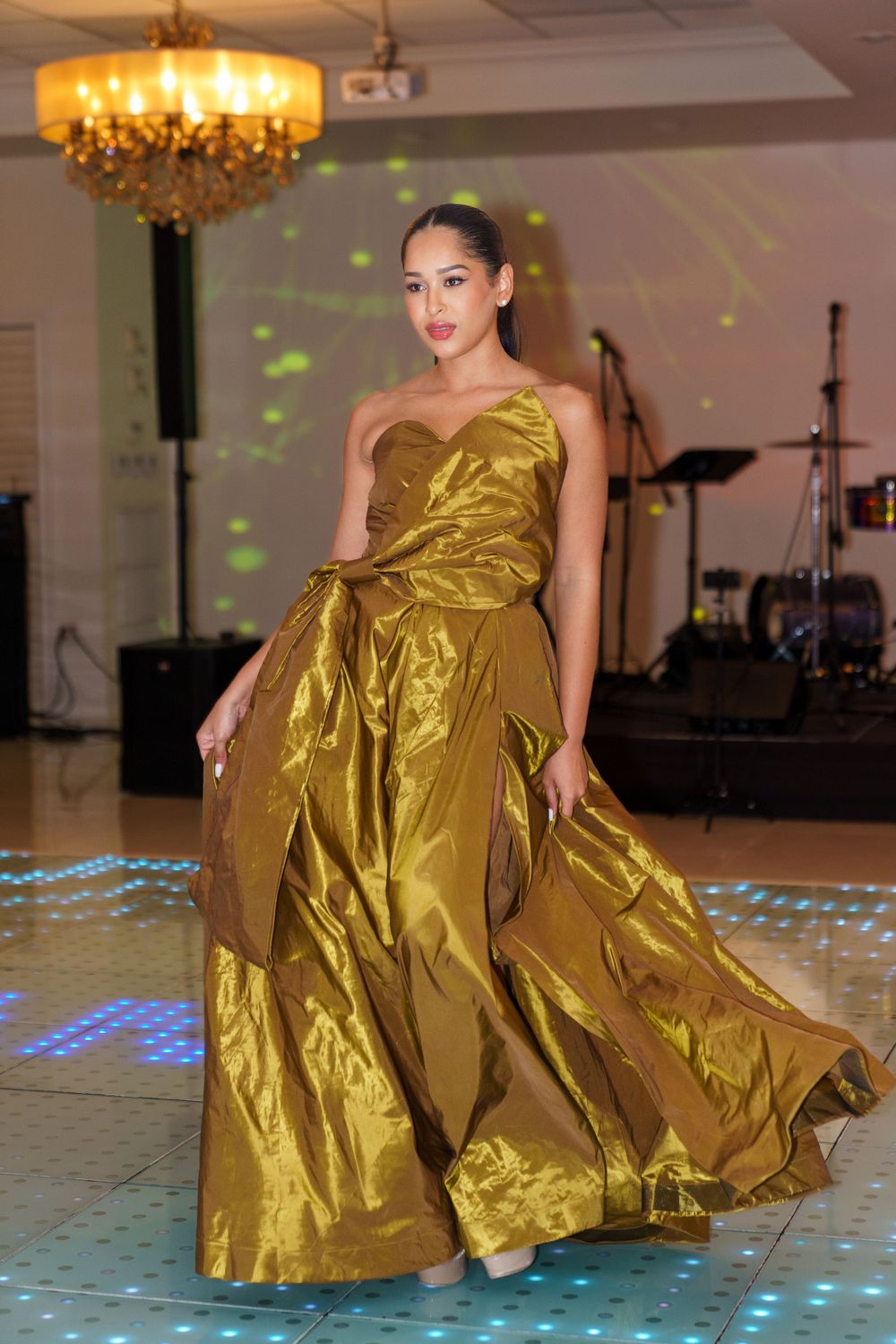 Model strutting runway in elegant gown at fashion show, dynamic event photography by SRX Media Group