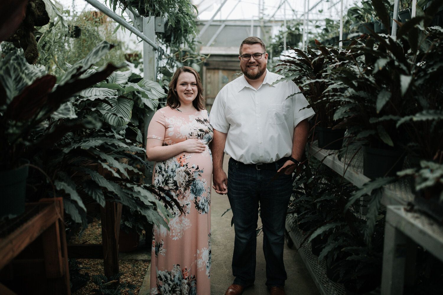 maternity photo in greenhouse