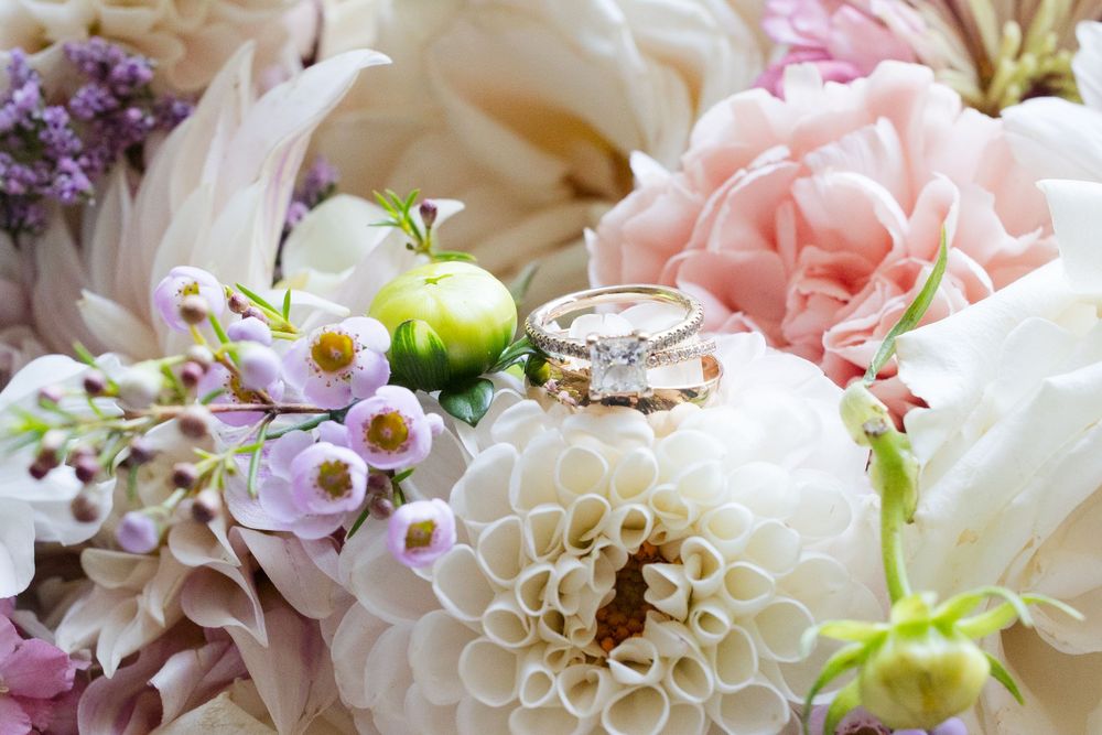 Romantic floral arrangement featuring pink, white, and purple blooms with soft petals.