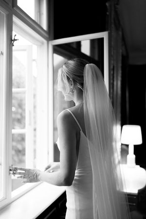 Artistic black and white photos showing silhouettes against bright windows.