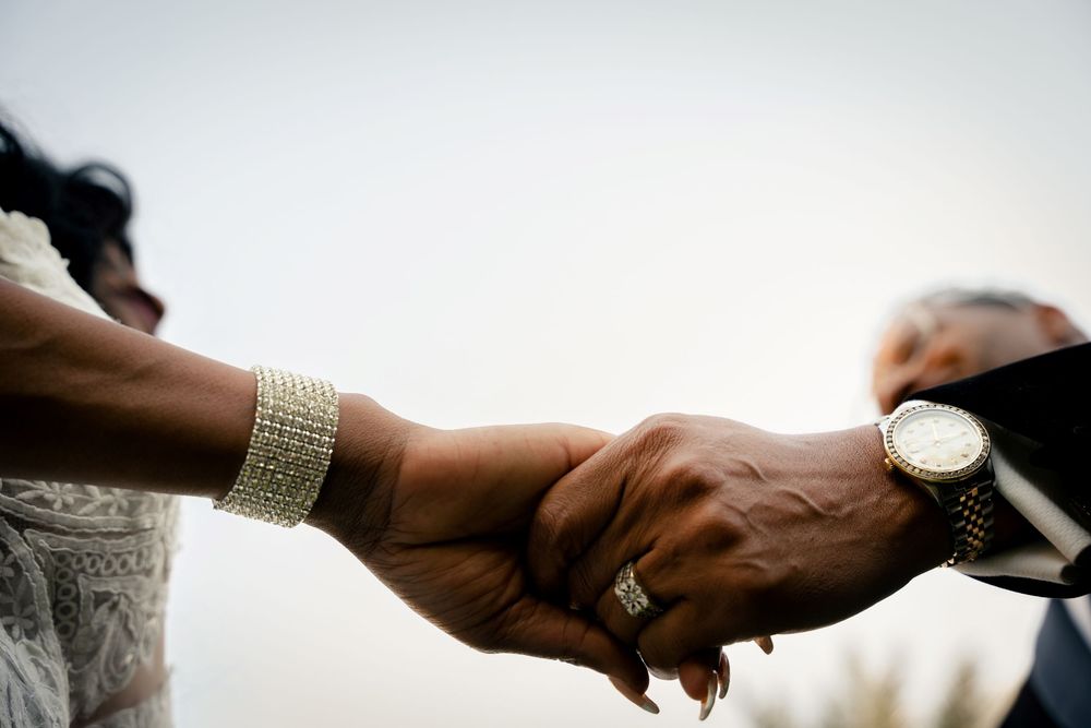 A close-up montage of newly weds holding hands. Las Vegas wedding photography.