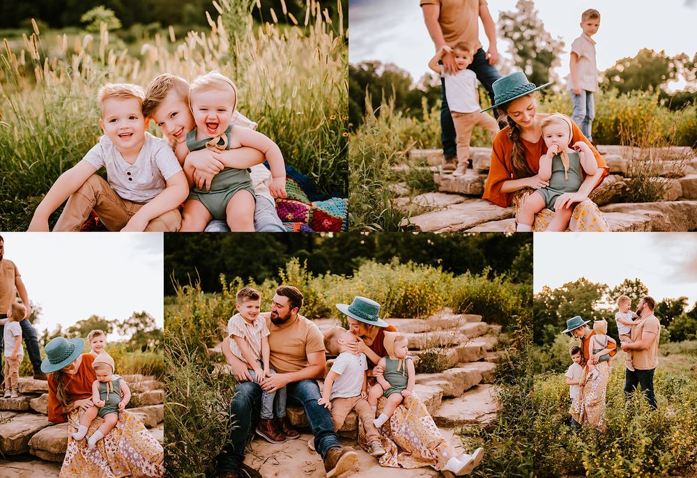 A family sits together on stone steps in a garden during a warm summer evening photo session.