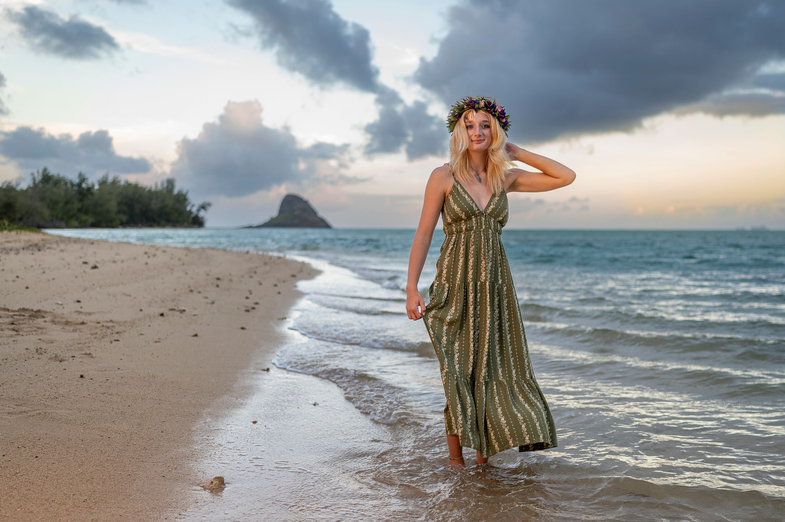A series of coastal beach scenes with waves crashing on shore at sunset while someone explores the sandy shoreline.