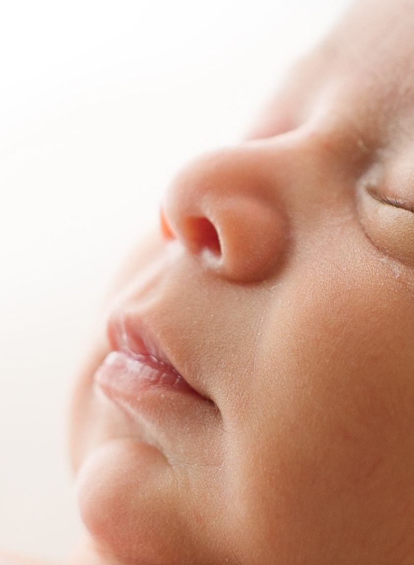 Close-up portrait of a sleeping newborn baby
