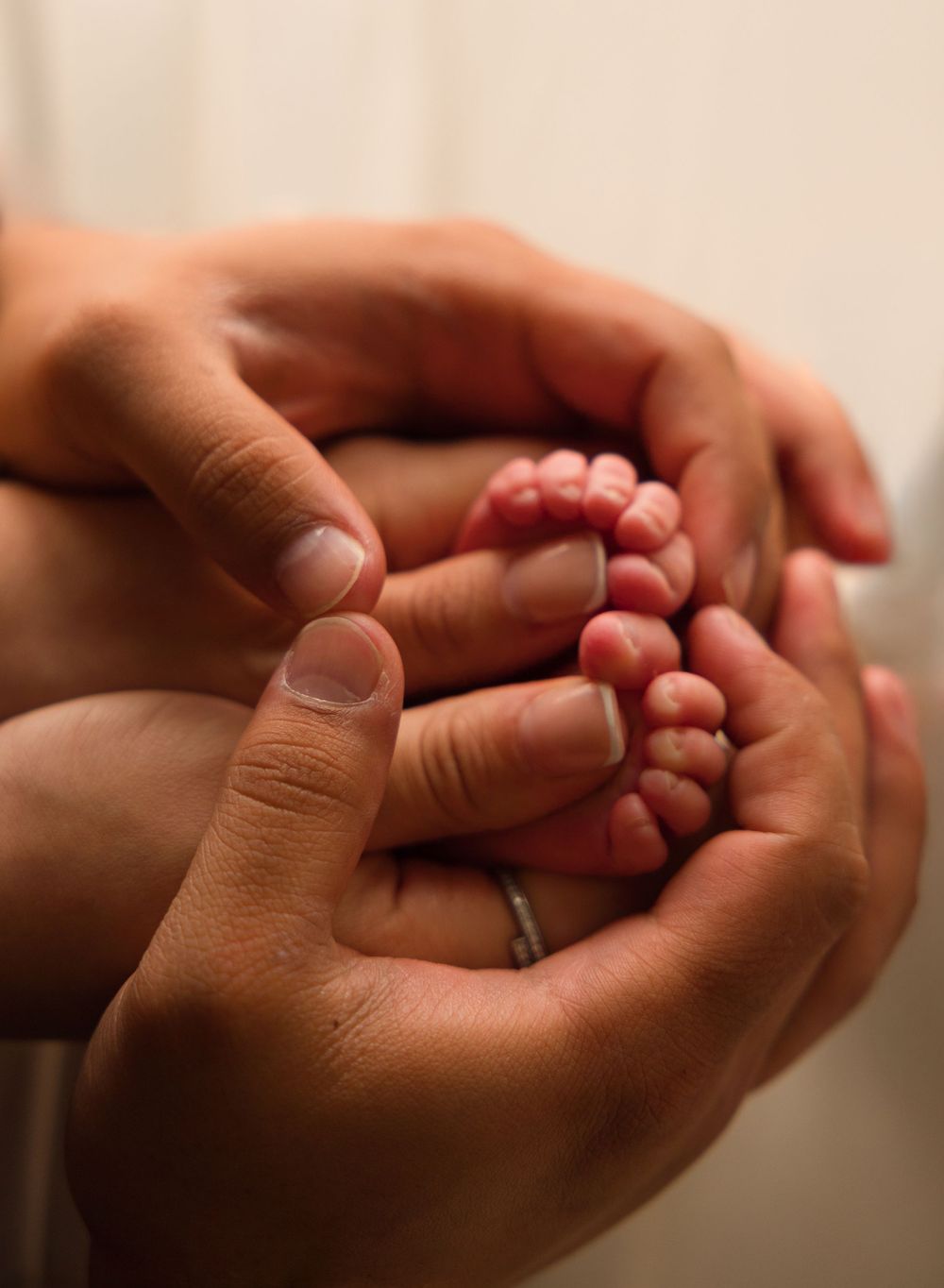 Close-up detail of a newborn baby's feet during a newborn session