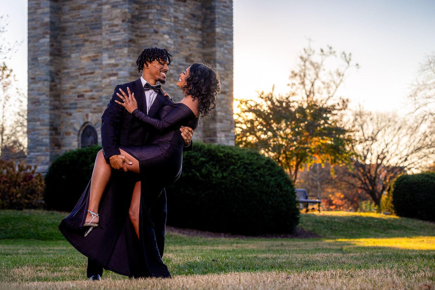 Frederick Maryland Wedding Photographer   - Romantic couple in formal attire share playful moment during sunset photo session.