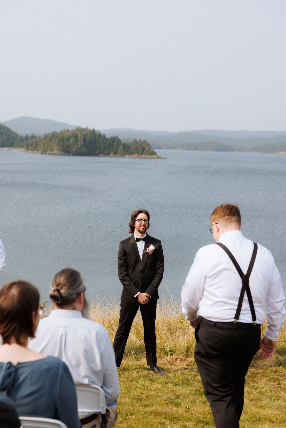 Outdoor ceremony on the Bonavista Peninsula by Newfoundland documentary style wedding photographer Kaitlyn Yvette