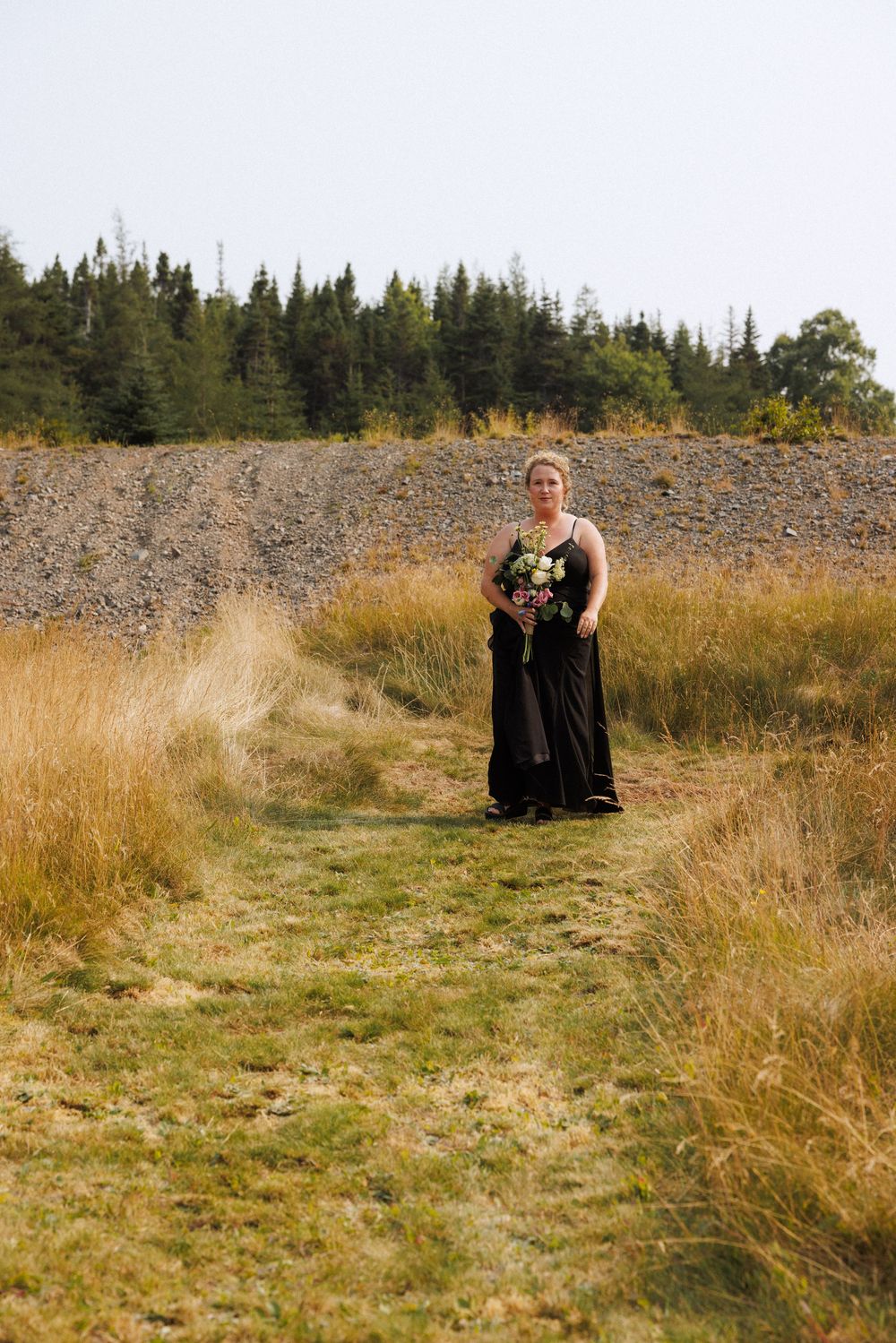 Outdoor ceremony on the Bonavista Peninsula by Newfoundland documentary style wedding photographer Kaitlyn Yvette