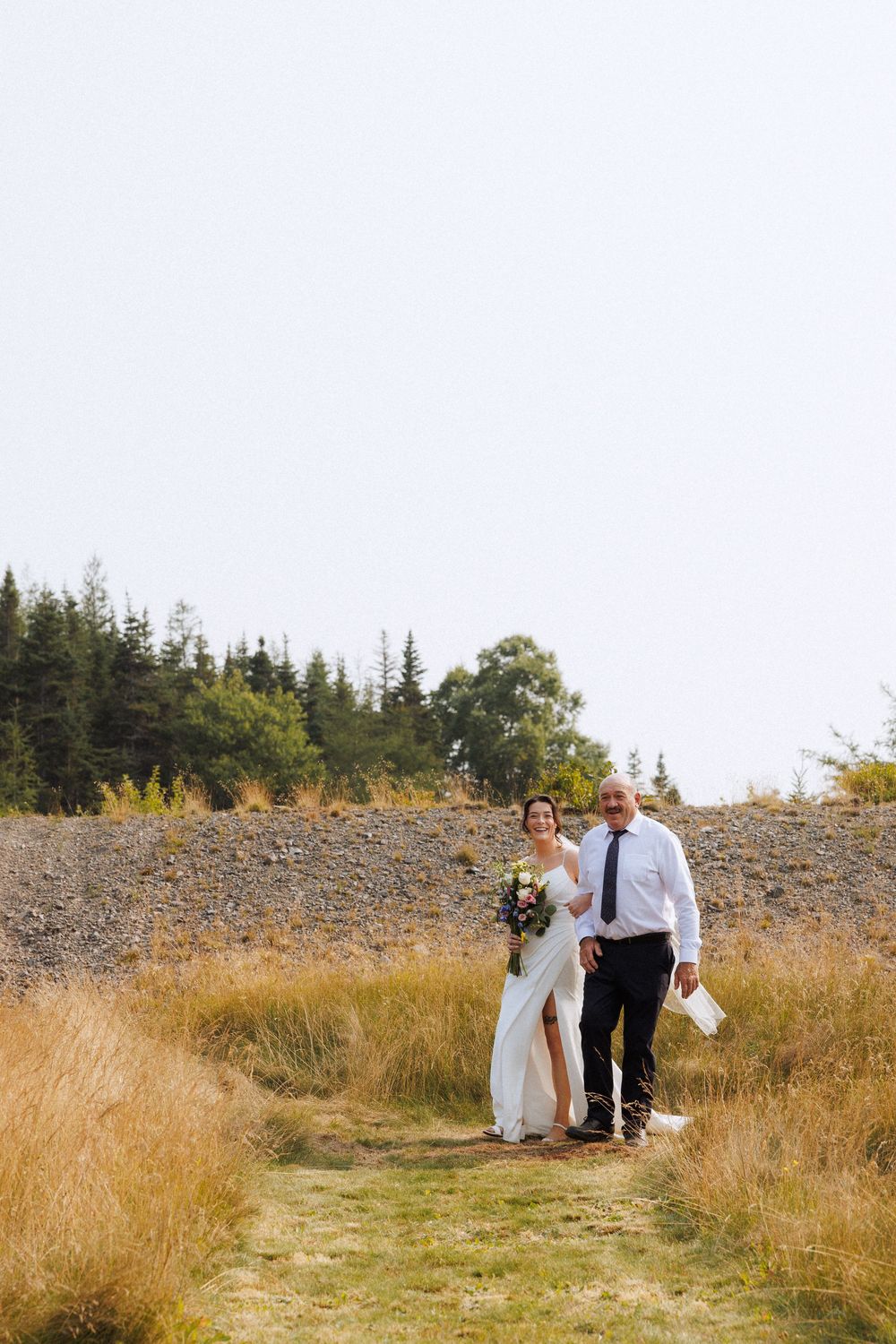 Outdoor ceremony on the Bonavista Peninsula by Newfoundland documentary style wedding photographer Kaitlyn Yvette