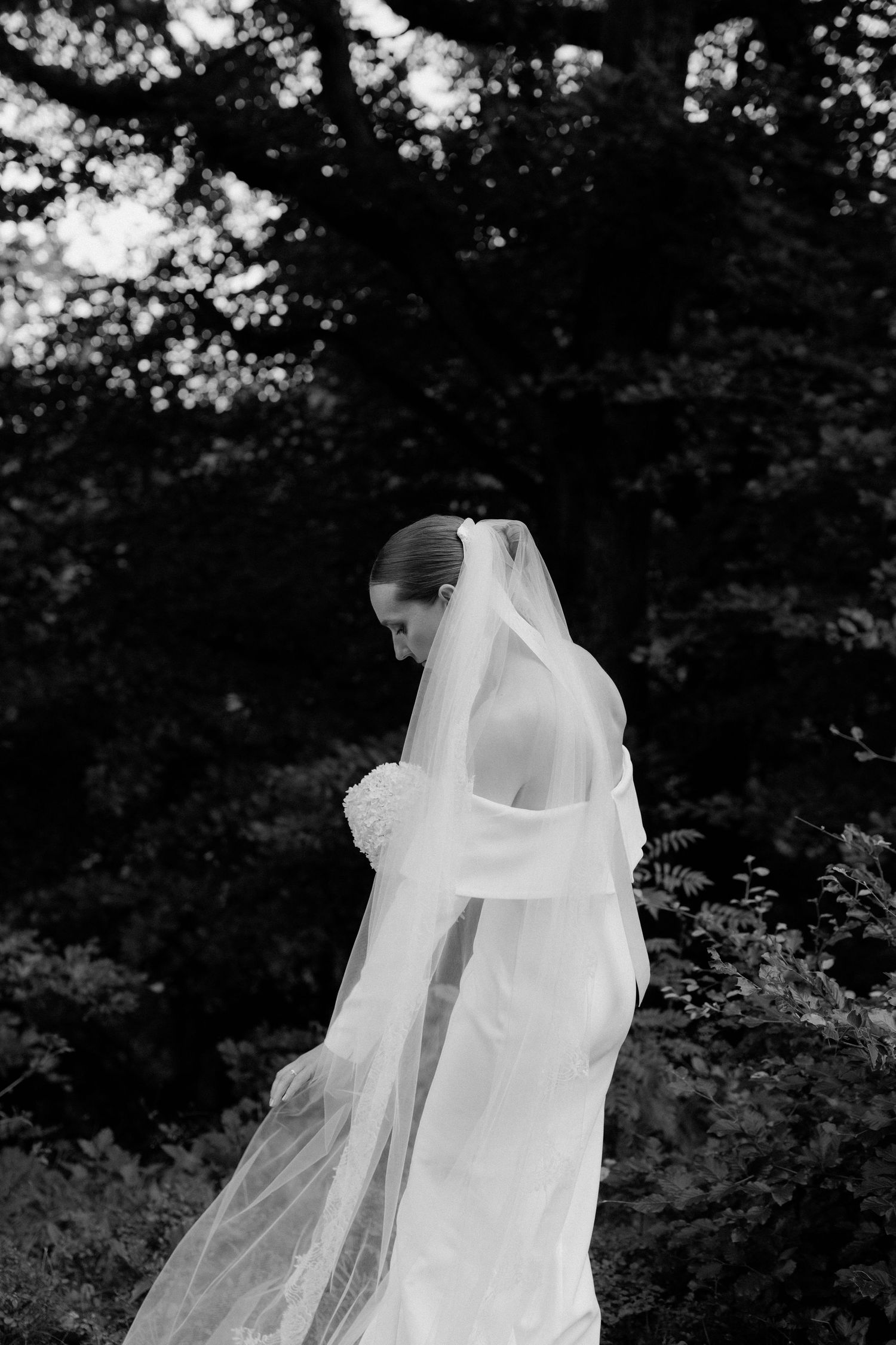 A black and white motion-blurred sequence shows a person in a wedding dress spinning with a flowing veil.