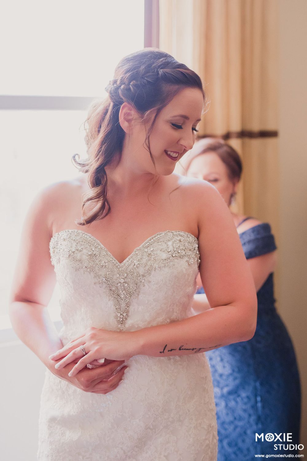 A series of close-up shots showing details of a strapless beaded wedding dress with sweetheart neckline.