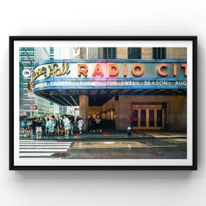 Crowd gathers outside the iconic Radio City Music Hall marquee in New York City.