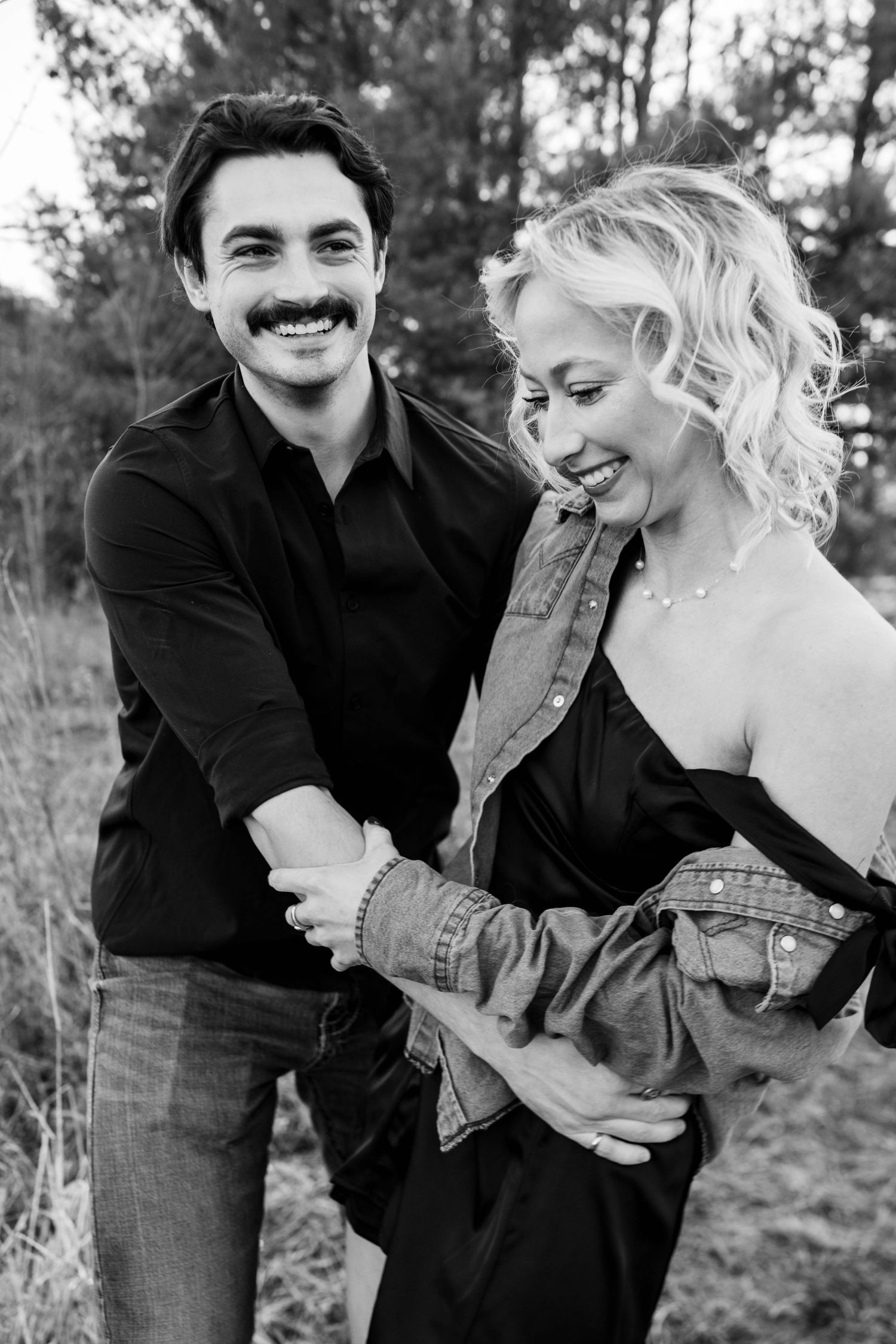 Black and white romantic couples session, capturing intimate moments and the timeless love between the couple.