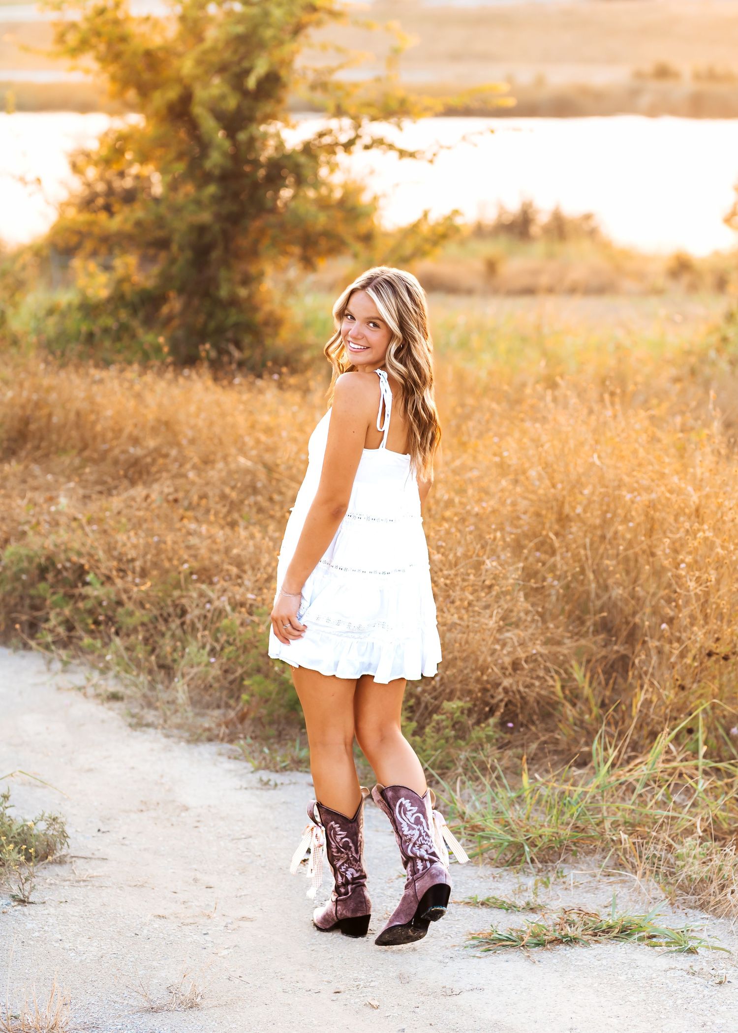 Boho senior photos in a field in Mckinney Tx