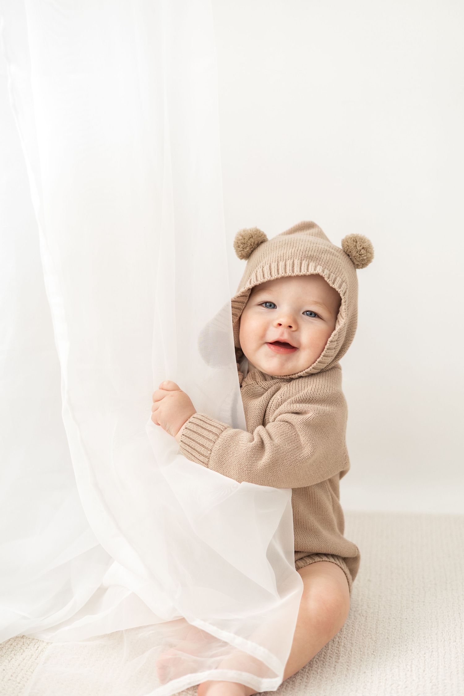 Baby first birthday photos Nottingham minimal studio setup neutral tones