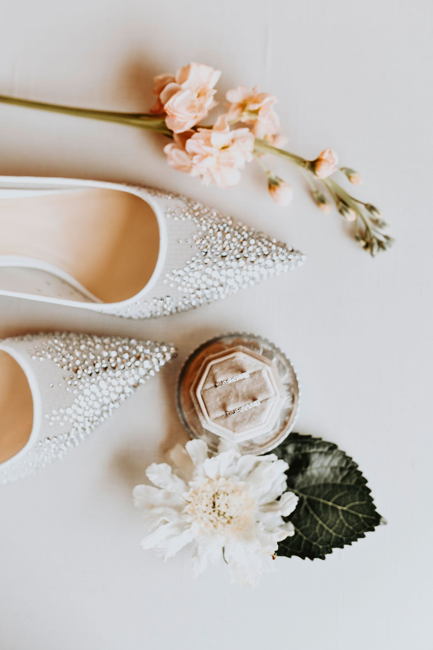Wedding reception decor with candles and greenery in McKinney