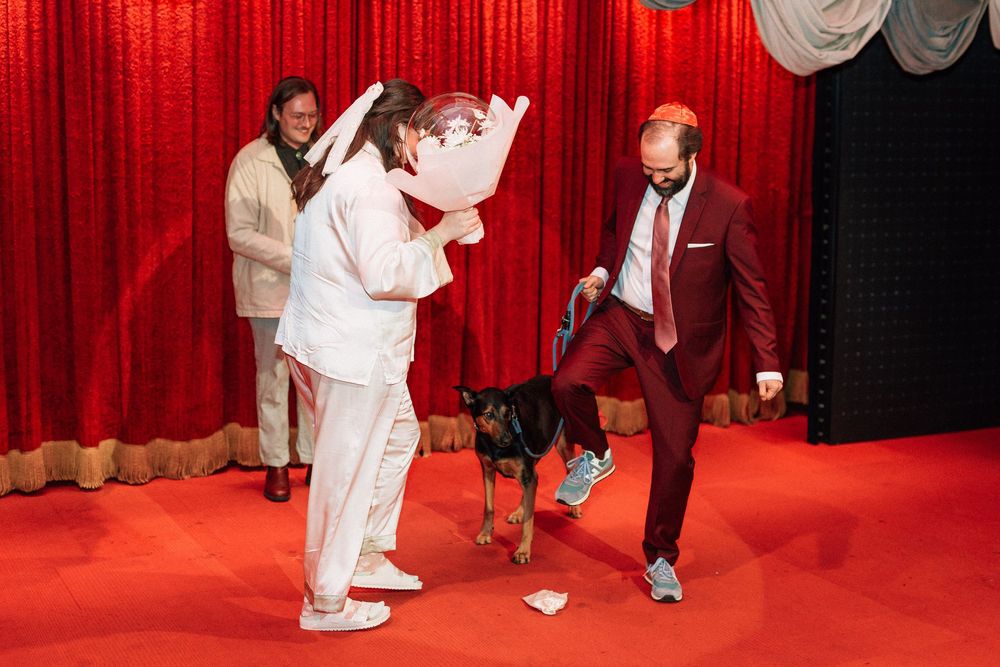 Groom smashes glass after wedding ceremony at Bob Baker theater