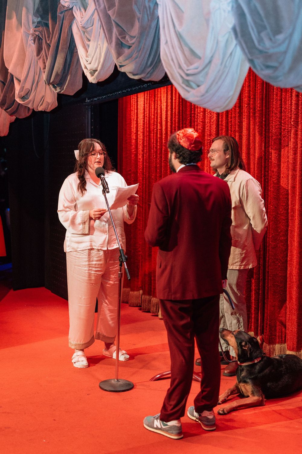 Bride exchanges vows before wedding at Bob Baker Marionette Theater in historic Los Angeles setting
