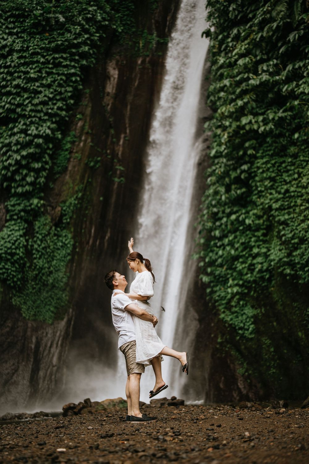 Bali couple photoshoot with waterfall background